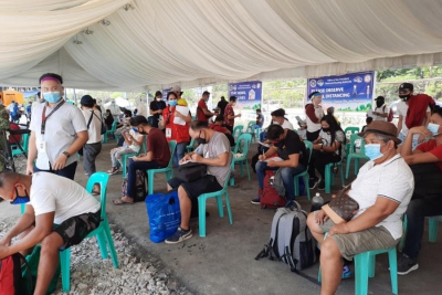 Qualified families undergo health screening at the BP2 send-off site prior to departure